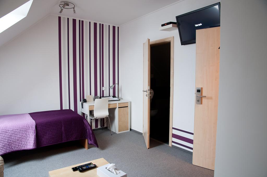 Hotel Berger Kamenice nad Lipou Quarto foto